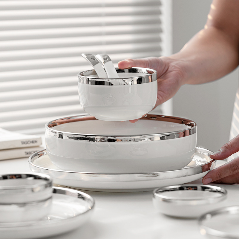 Ceramic tableware with gold and silver rims